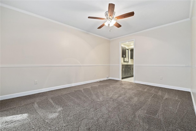 carpeted empty room with baseboards, ceiling fan, and crown molding