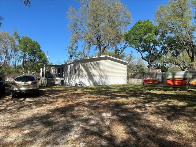 view of yard featuring fence