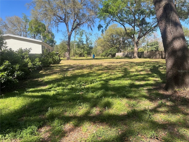 view of yard with fence