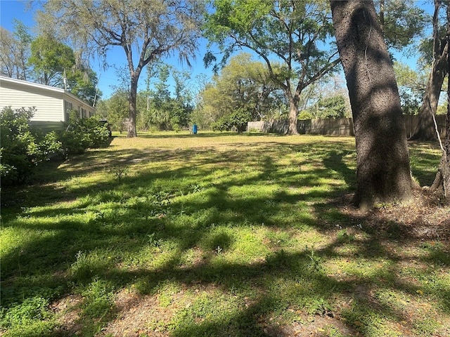 view of yard featuring fence