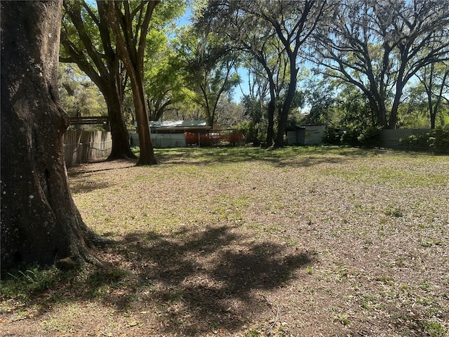 view of yard featuring fence