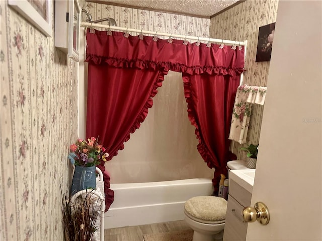 bathroom with wallpapered walls, toilet, shower / bath combo, and a textured ceiling