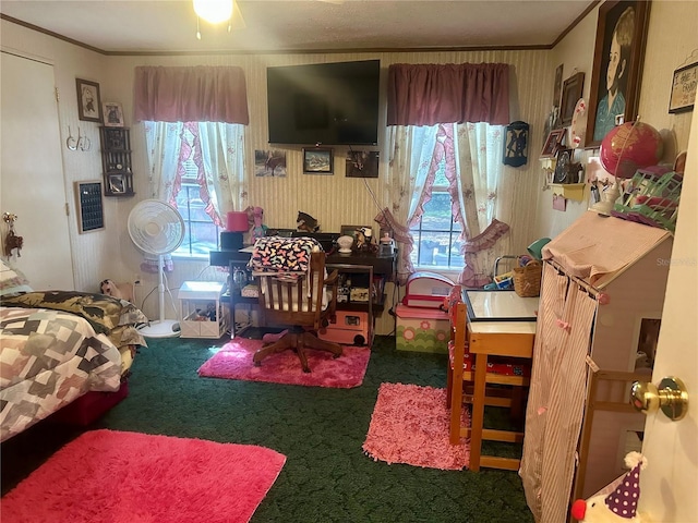 bedroom with wallpapered walls, crown molding, multiple windows, and carpet flooring