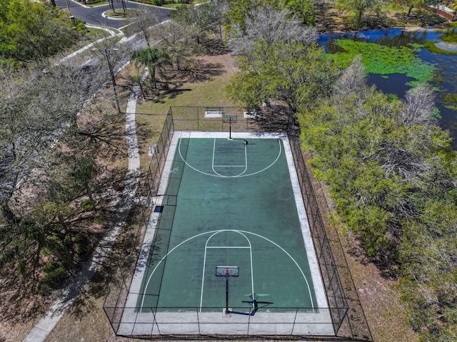 view of sport court featuring community basketball court and fence