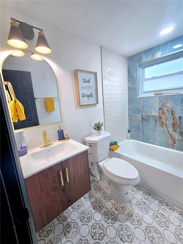 full bath with tile patterned flooring, tub / shower combination, toilet, and vanity