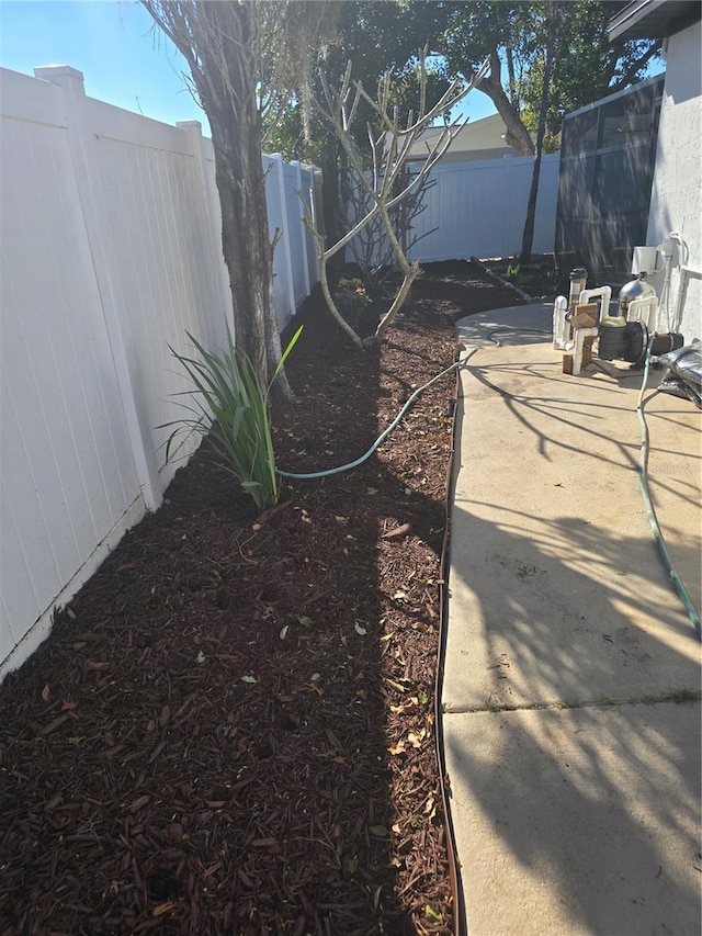 view of yard with a fenced backyard