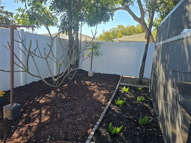 view of yard with a fenced backyard