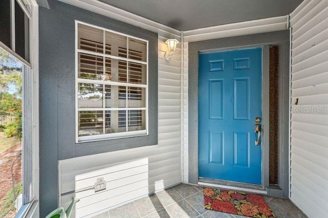 property entrance with a porch