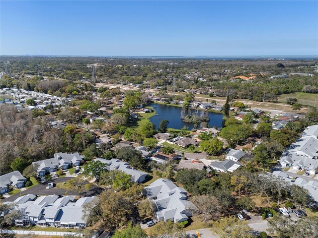 bird's eye view with a residential view and a water view