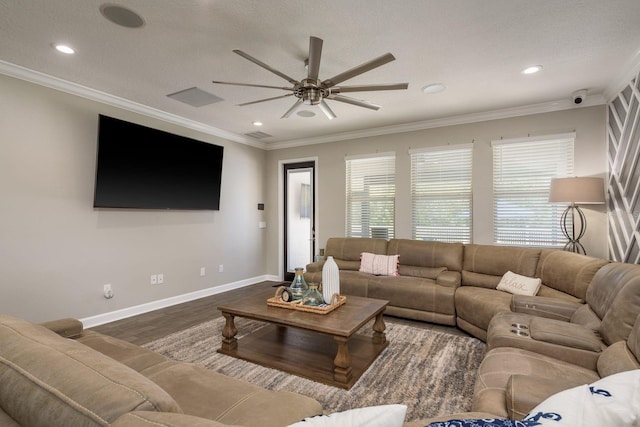 living room featuring recessed lighting, baseboards, wood finished floors, and ornamental molding