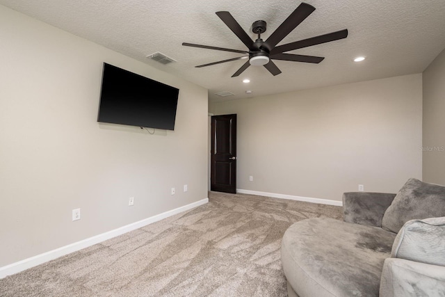 unfurnished room with recessed lighting, baseboards, visible vents, and light carpet