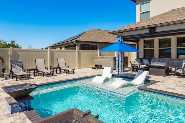 view of swimming pool with an outdoor living space with a fire pit, a fenced in pool, a patio area, and fence