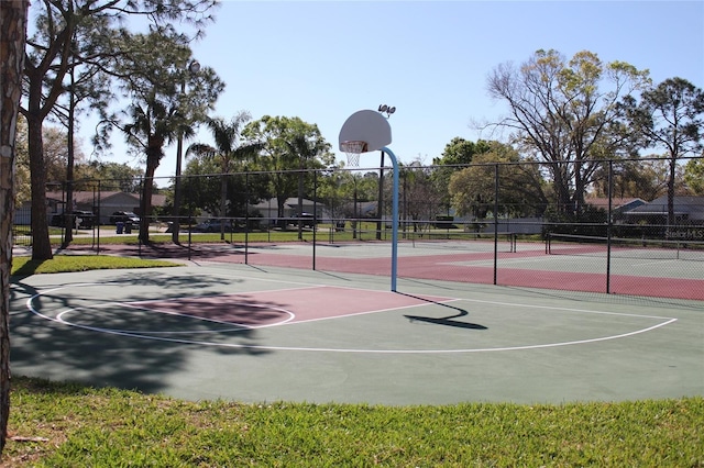 view of sport court with community basketball court and fence