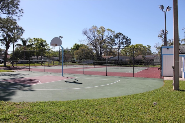 view of sport court featuring community basketball court and fence