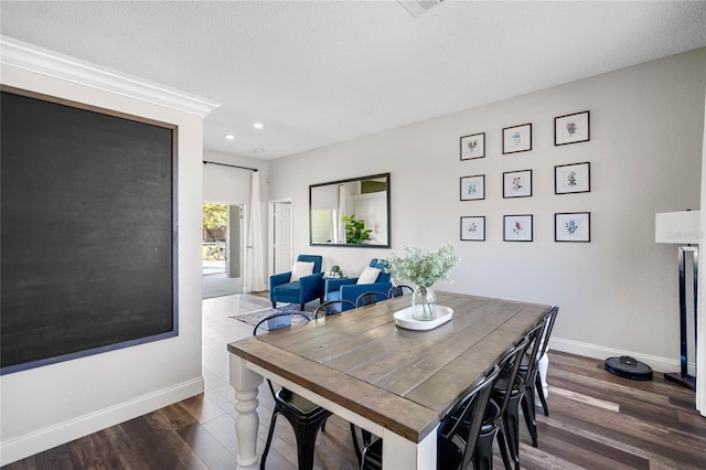 dining room featuring visible vents, recessed lighting, wood finished floors, and baseboards