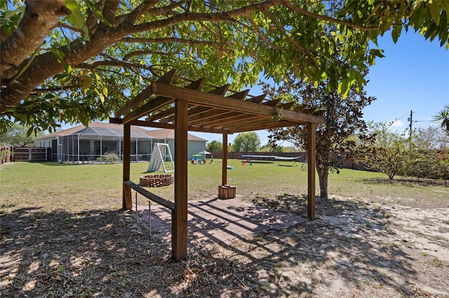 view of yard featuring a fire pit and a pergola