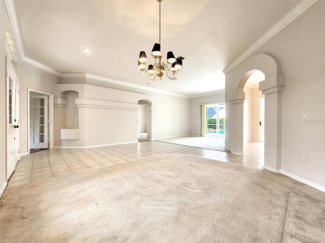 unfurnished living room featuring arched walkways, light colored carpet, an inviting chandelier, and light tile patterned flooring