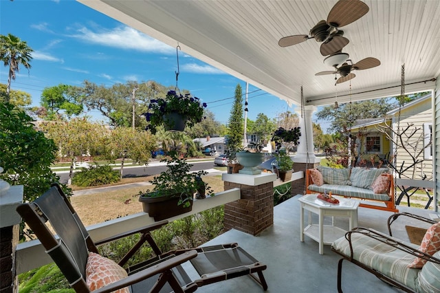 view of patio / terrace with an outdoor hangout area, covered porch, and ceiling fan