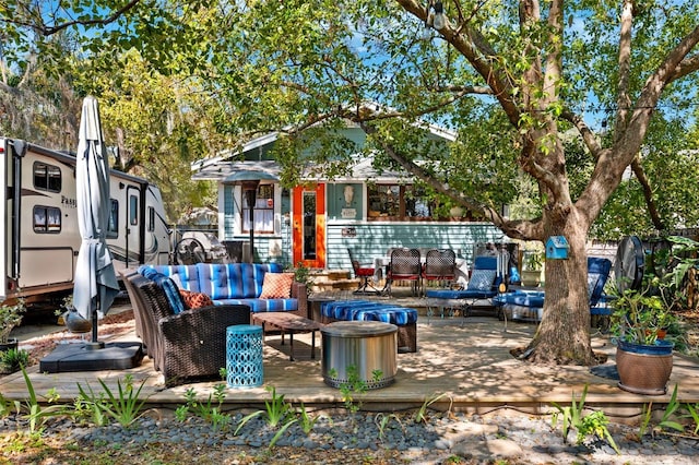 view of patio / terrace with a deck and an outdoor hangout area