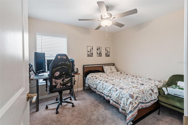 carpeted bedroom with baseboards and ceiling fan