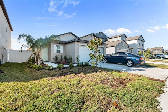 view of front of home featuring stucco siding, a gate, fence, concrete driveway, and an attached garage