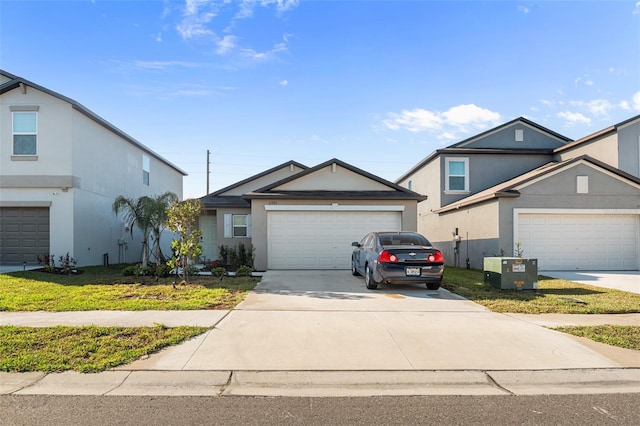 traditional home featuring concrete driveway, a garage, and stucco siding