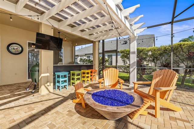 view of patio / terrace featuring outdoor dry bar and a pergola