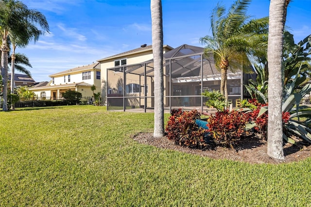 view of yard with a lanai