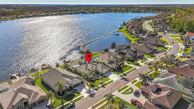 aerial view featuring a residential view and a water view