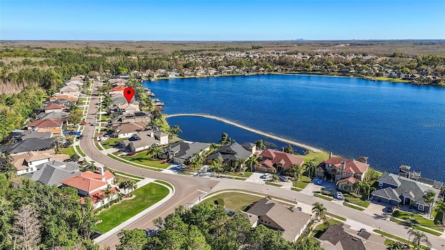 aerial view with a residential view and a water view