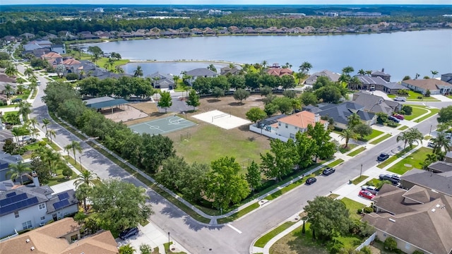 aerial view featuring a residential view and a water view