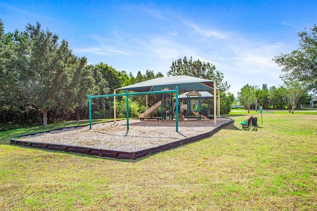 community jungle gym with a yard