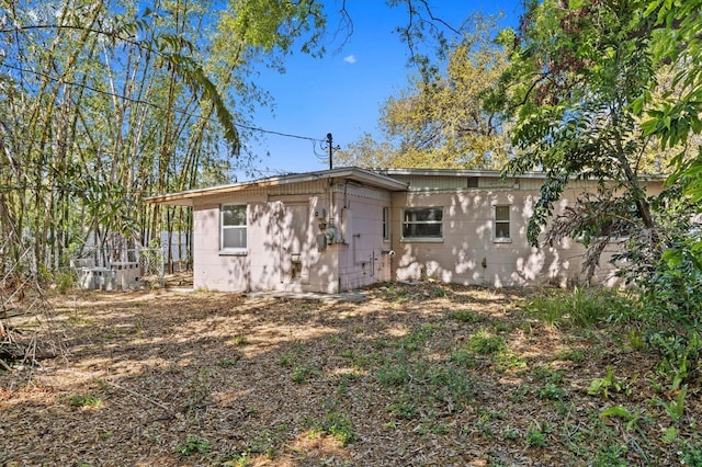 view of outdoor structure with fence