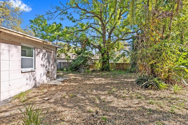 view of yard with fence