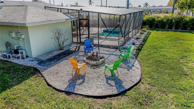 view of yard featuring a patio area, glass enclosure, an outdoor pool, and an outdoor fire pit