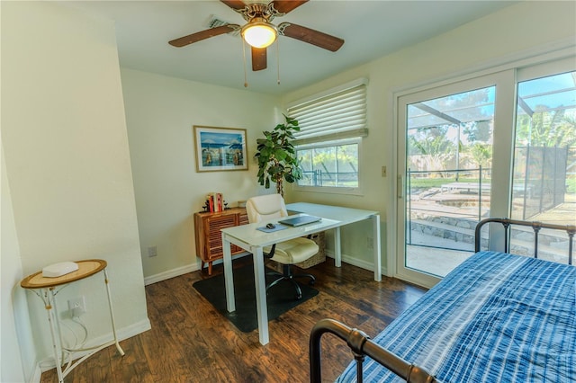 office area featuring wood finished floors, baseboards, and ceiling fan