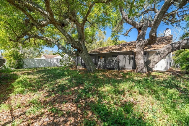 view of yard with fence