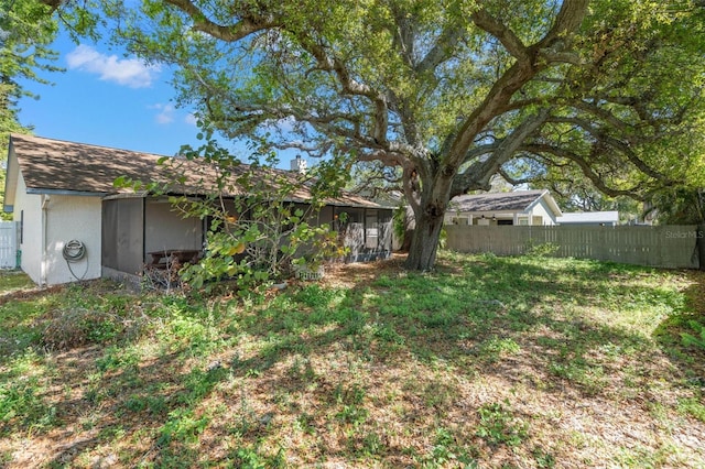 view of yard featuring fence