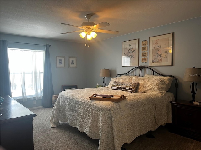 bedroom with baseboards, carpet, and ceiling fan