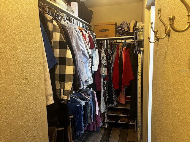 spacious closet featuring wood finished floors