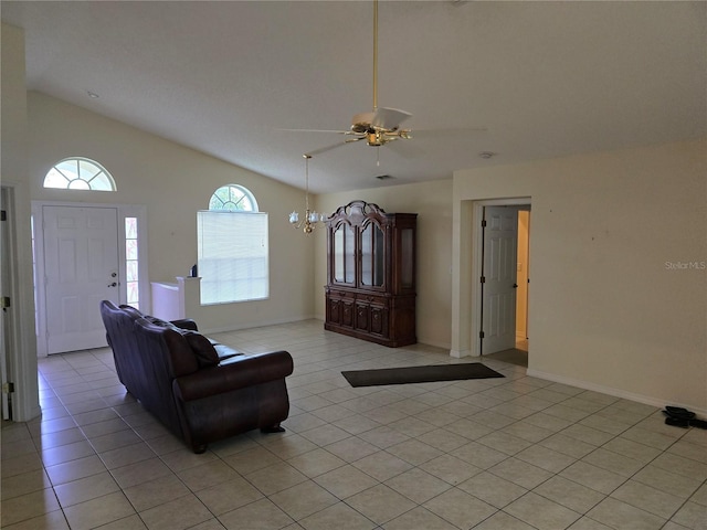 living room with light tile patterned floors, high vaulted ceiling, baseboards, and a ceiling fan