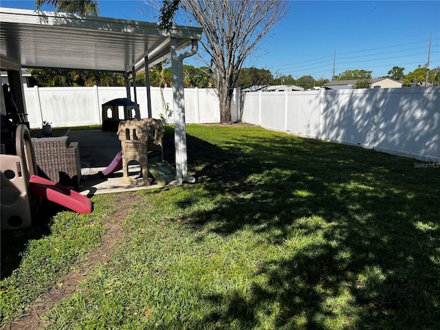 view of yard with a fenced backyard