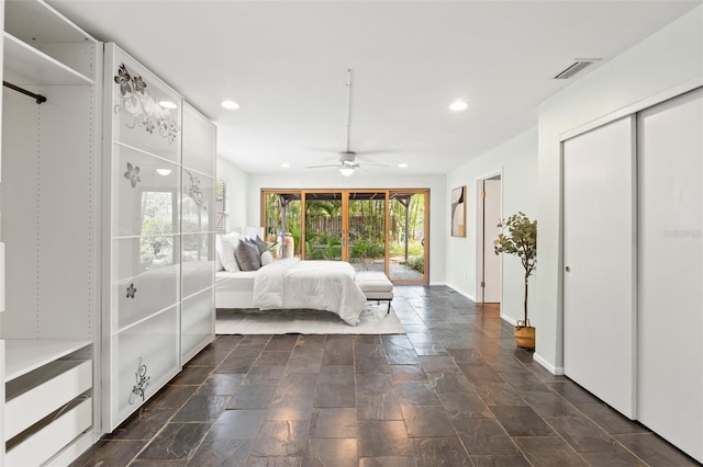 unfurnished bedroom with recessed lighting, visible vents, baseboards, and stone tile flooring