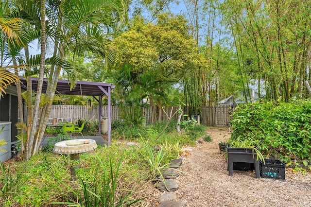 view of yard featuring fence