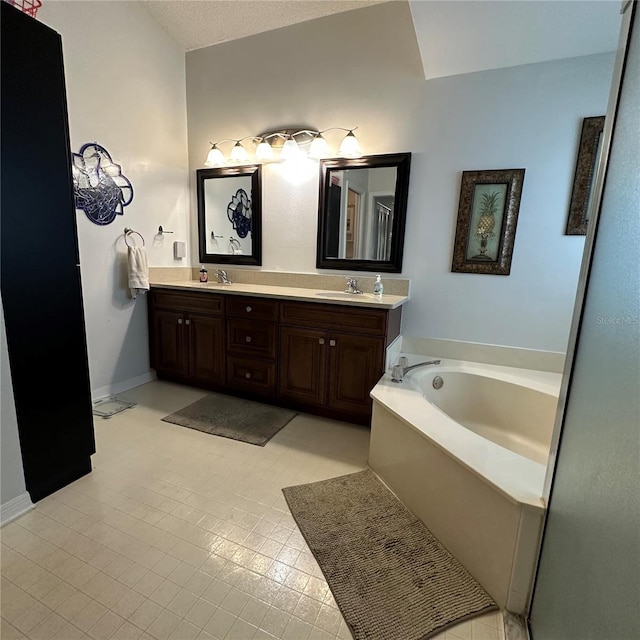 bathroom featuring double vanity, baseboards, a garden tub, and a sink