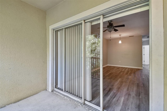 exterior space featuring visible vents and stucco siding