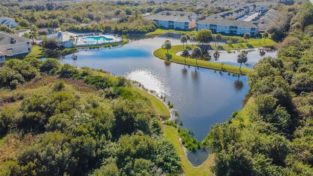 birds eye view of property featuring a water view