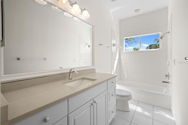 full bathroom featuring tile patterned flooring, washtub / shower combination, toilet, and vanity