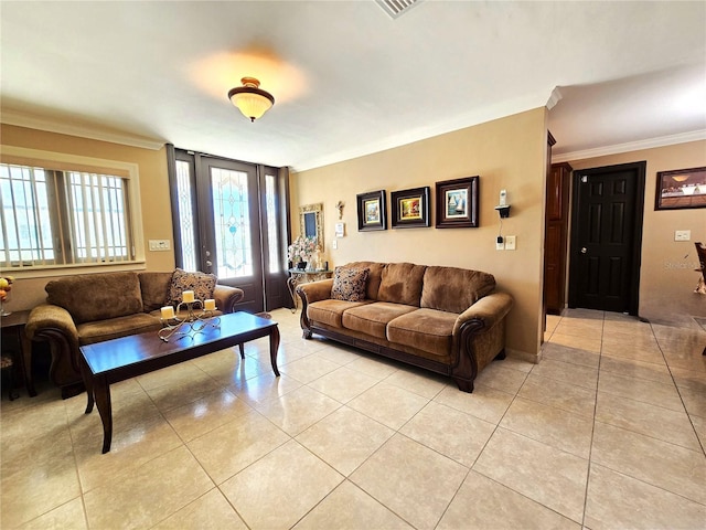 living area featuring light tile patterned floors and crown molding