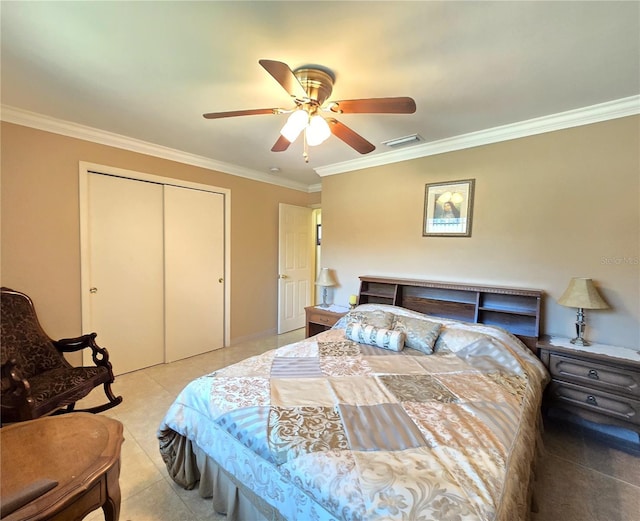 bedroom with a ceiling fan, visible vents, light tile patterned flooring, ornamental molding, and a closet